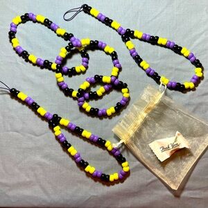 Tri-color 4-pc yellow, purple, and black beaded set for young adult.